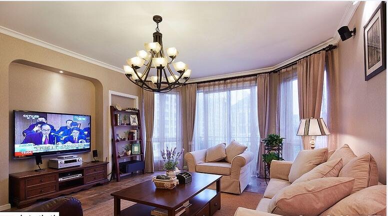 南宁香樟林不规则客厅创意吊灯嵌入式电视墙组合沙发红木地板效果图